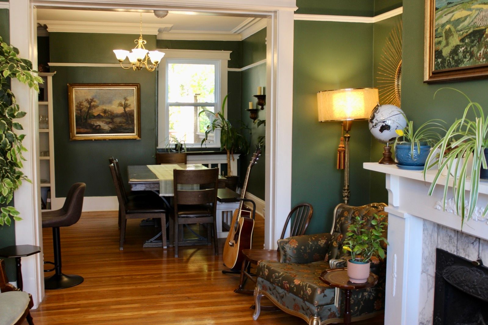 The LaCour House dining room with guitar and fireplace